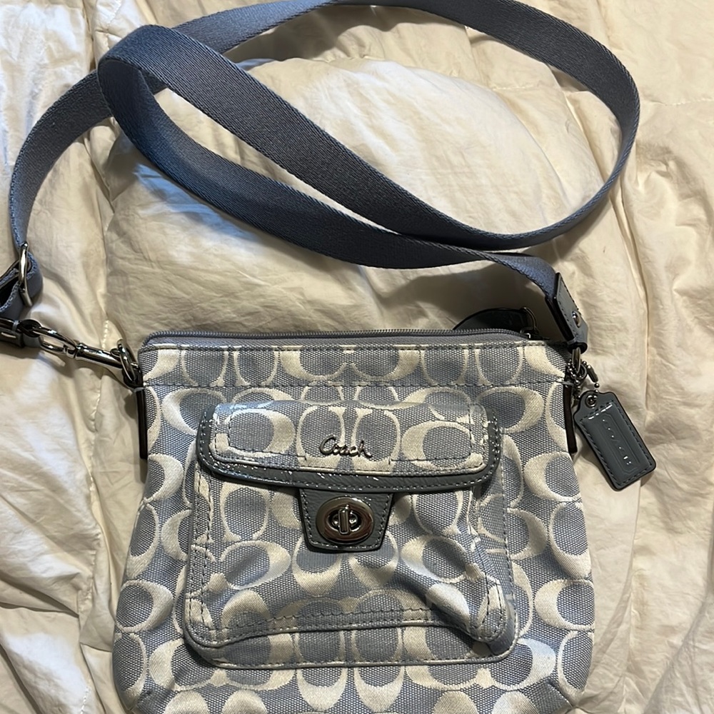 Light blue coach logo crossbody bag